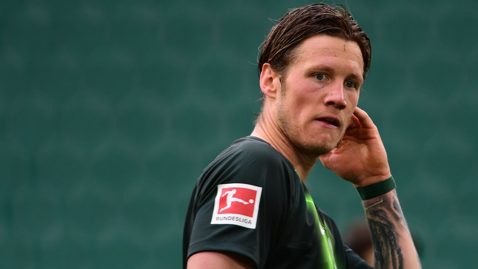 Arsenal and Newcastle United are keen in Wolfsburg's towering striker Wout Weghorst  